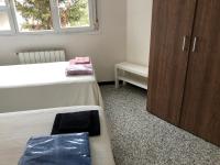 A bed or beds in a room at Luxury Apartment in Moncloa-Aravaca