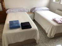 A bed or beds in a room at Luxury Apartment in Moncloa-Aravaca