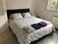 A bed or beds in a room at Luxury Apartment in Moncloa-Aravaca