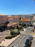 an aerial view of a street with cars parked on the street at Appartement coeur ville - Casa Riviera Mimosa in Sainte-Maxime