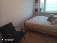 Posteľ alebo postele v izbe v ubytovaní Mieszkanie Antoni