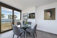 TV a/nebo společenská místnost v ubytování Mediterraneo Beach Apartment in Malaga by Solaga Holiday Homes