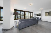 Posezení v ubytování Mediterraneo Beach Apartment in Malaga by Solaga Holiday Homes