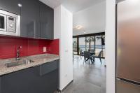 Kuchyň nebo kuchyňský kout v ubytování Mediterraneo Beach Apartment in Malaga by Solaga Holiday Homes