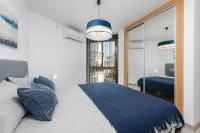 Postel nebo postele na pokoji v ubytování Mediterraneo Beach Apartment in Malaga by Solaga Holiday Homes