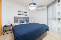Postel nebo postele na pokoji v ubytování Mediterraneo Beach Apartment in Malaga by Solaga Holiday Homes