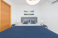 Postel nebo postele na pokoji v ubytování Mediterraneo Beach Apartment in Malaga by Solaga Holiday Homes