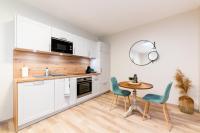 Kuchnia lub aneks kuchenny w obiekcie Les coursives appartements