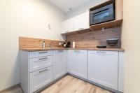Kuchnia lub aneks kuchenny w obiekcie Les coursives appartements
