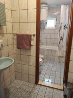 Kúpeľňa v ubytovaní Apartments Dodik