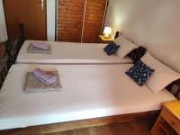 Posteľ alebo postele v izbe v ubytovaní Apartments Dodik