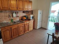 Kuchyňa alebo kuchynka v ubytovaní Apartments Dodik