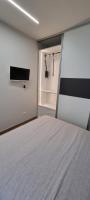 A bed or beds in a room at IO E TE bed and breakfast Appartamento