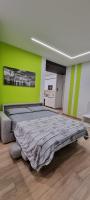 A bed or beds in a room at IO E TE bed and breakfast Appartamento