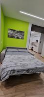 A bed or beds in a room at IO E TE bed and breakfast Appartamento