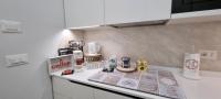 A kitchen or kitchenette at IO E TE bed and breakfast Appartamento