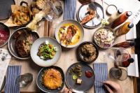 a table with many plates of food on it at Ocean Views & Private Beach! Luxury 4BDR Getaway in Punta Cana