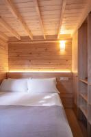 Posteľ alebo postele v izbe v ubytovaní wecamp Cala Montgó
