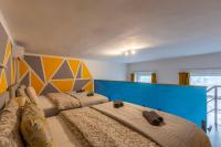 Posteľ alebo postele v izbe v ubytovaní Deluxe Residence By Bella