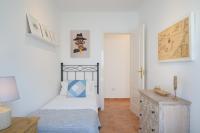 Łóżko lub łóżka w pokoju w obiekcie Casa Vela Marina, Puerto Calero
