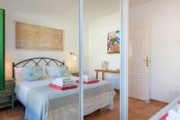 Łóżko lub łóżka w pokoju w obiekcie Casa Vela Marina, Puerto Calero