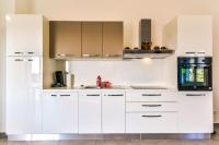 Kuchyňa alebo kuchynka v ubytovaní Apartments Lia-Jolie