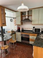 Kuchyňa alebo kuchynka v ubytovaní Aguatapa Apartamento