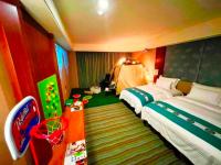 a bedroom with two beds and a tent at Fullon Hotel Tamsui Fishermen&#39;s Wharf in Tamsui