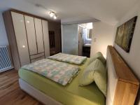 Posteľ alebo postele v izbe v ubytovaní Appartements Pfausler
