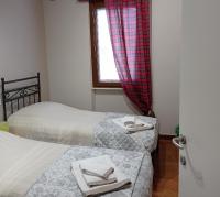 Posteľ alebo postele v izbe v ubytovaní AL CORNIOLO