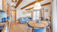 Kuchyňa alebo kuchynka v ubytovaní Apartamenty Sun & Snow Port Krynica przy porcie i promenadzie