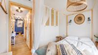 Posteľ alebo postele v izbe v ubytovaní Apartamenty Sun & Snow Port Krynica przy porcie i promenadzie
