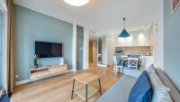 Kuchyňa alebo kuchynka v ubytovaní Apartamenty Sun & Snow Port Krynica przy porcie i promenadzie