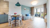 Posedenie v ubytovaní Apartamenty Sun & Snow Port Krynica przy porcie i promenadzie