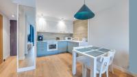 Kuchyňa alebo kuchynka v ubytovaní Apartamenty Sun & Snow Port Krynica przy porcie i promenadzie
