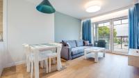 Posedenie v ubytovaní Apartamenty Sun & Snow Port Krynica przy porcie i promenadzie