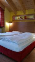 Posteľ alebo postele v izbe v ubytovaní Chalet Heidi