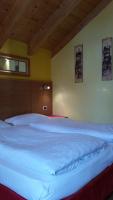 Posteľ alebo postele v izbe v ubytovaní Chalet Heidi