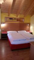 Posteľ alebo postele v izbe v ubytovaní Chalet Heidi