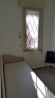 A bed or beds in a room at Residence Summer Dream