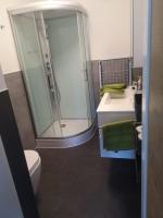 A bathroom at HomeW4 - Rosen Apartment