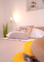 Łóżko lub łóżka w pokoju w obiekcie Apartment Katarina Vrboska