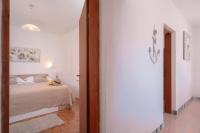 Łóżko lub łóżka w pokoju w obiekcie Apartment Katarina Vrboska