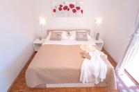 Łóżko lub łóżka w pokoju w obiekcie Apartment Katarina Vrboska