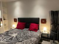 Łóżko lub łóżka w pokoju w obiekcie VILLA LUXUEUSE