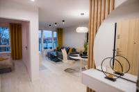 Część wypoczynkowa w obiekcie Nowoczesny apartament Ludova