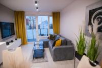 Część wypoczynkowa w obiekcie Nowoczesny apartament Ludova
