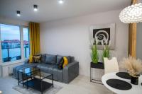 Część wypoczynkowa w obiekcie Nowoczesny apartament Ludova