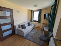 Posezení v ubytování Stylish 2BD Apartment with Panoramic Mountain View by Flat Mаnager