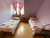 Posteľ alebo postele v izbe v ubytovaní Hermina apartmanház